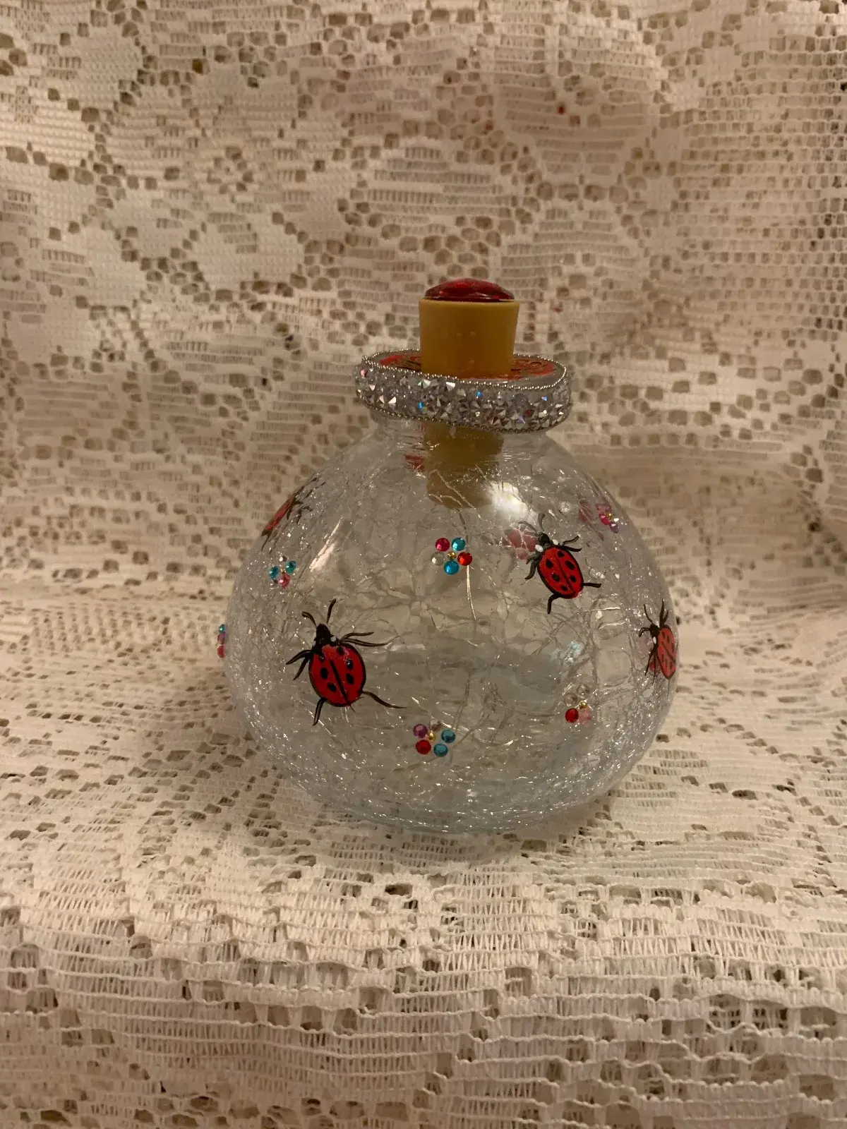 Hand-painted glass bottles with fairy lights